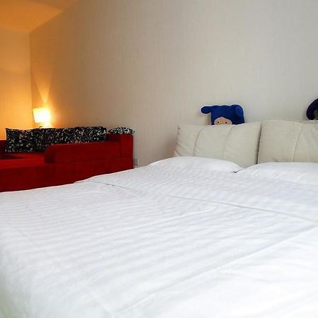 Mini Impression Hotel Xinghaitun Bagian luar foto
