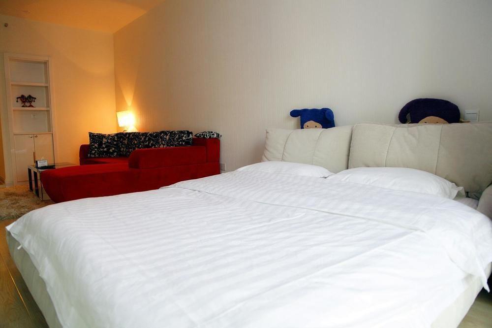 Mini Impression Hotel Xinghaitun Bagian luar foto