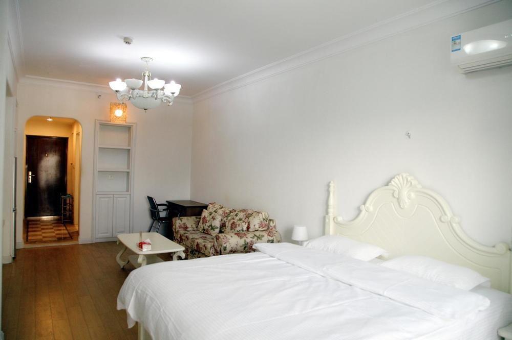 Mini Impression Hotel Xinghaitun Bagian luar foto