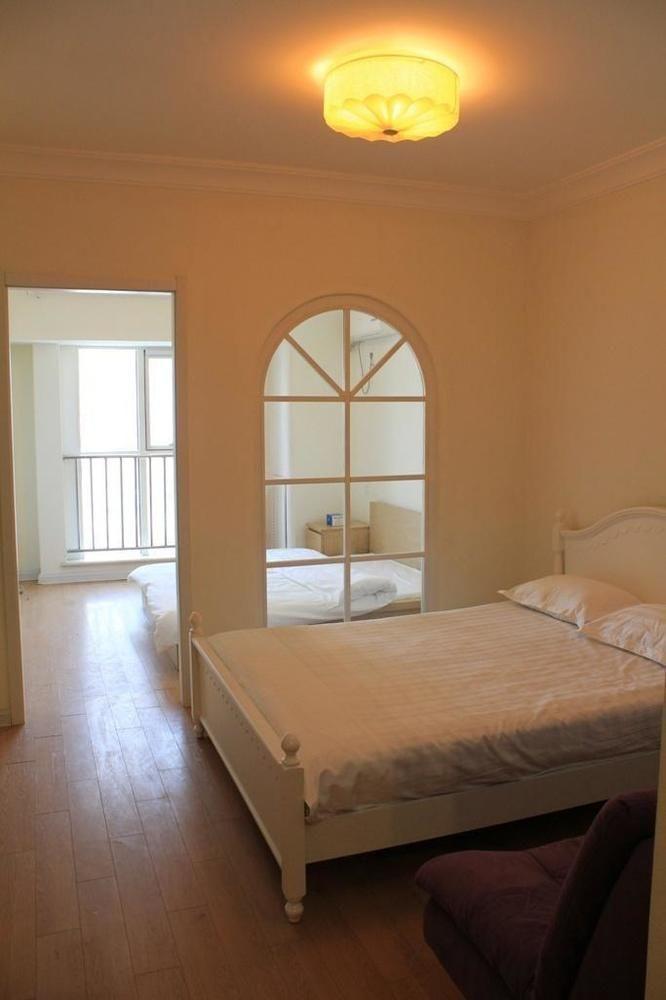 Mini Impression Hotel Xinghaitun Bagian luar foto