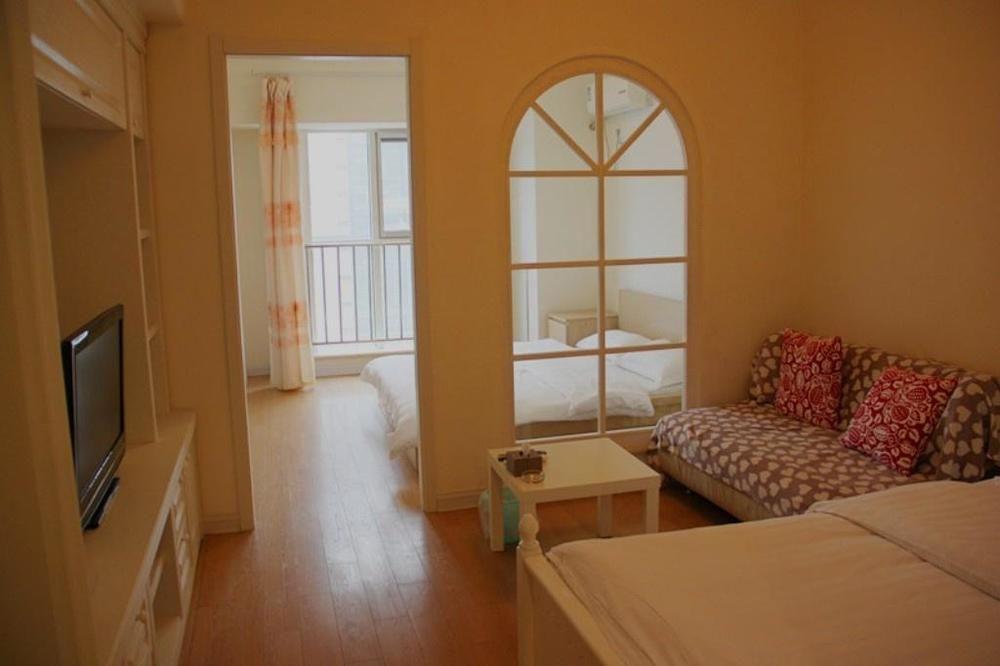 Mini Impression Hotel Xinghaitun Bagian luar foto